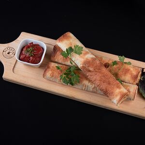 Լավաշի բրդուճներ խոզապուխտով և պանրով