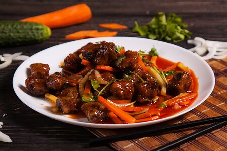 Ребра свиные с овощами в кисло-сладком соусе