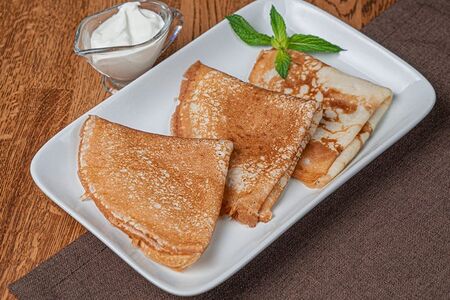 Блины со сметаной