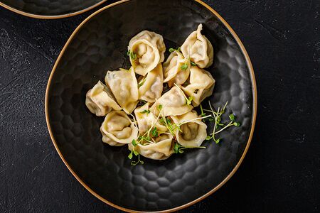 Пельмени с уткой и вялеными томатами 