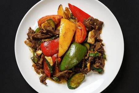 Мясо с овощами в кисло-остром соусе