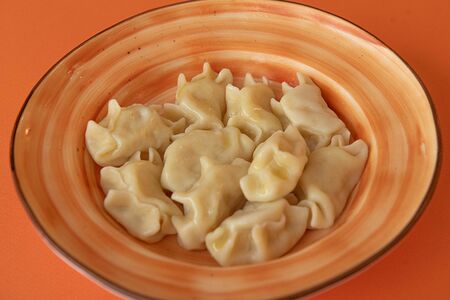 Вареники сладкие с творогом отварные