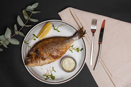 Дорадо с ароматными травами