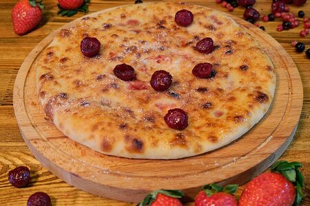 Осетинский пирог с творогом и вишней   