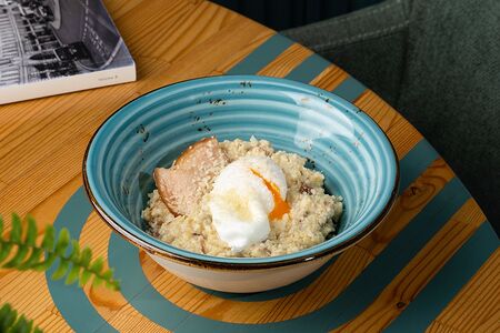 Каша пшённая с шейкой, яйцом пашот и пармезаном