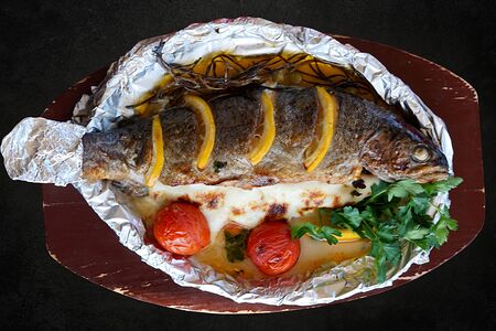 Сибас в дровяной печи на сырной подушке