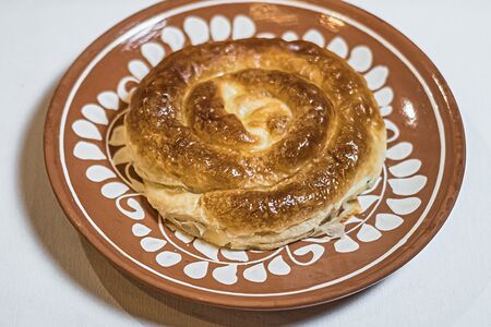 Запеченная плацында с творогом и зеленью