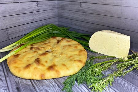 Осетинский пирог с сыром и зеленью