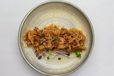 Тушеная квашеная капуста с беконом