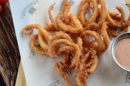 Щупальца кальмара с соусом восточный