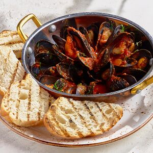 Соте мидий в томатном соусе