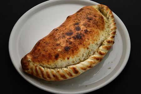 Кальцоне с ветчиной