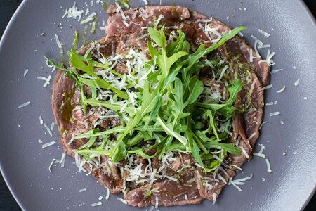 Карпаччо из говяжьей вырезки с трюфельной заправкой