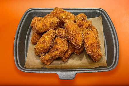 Куриные крылья в панировке острые