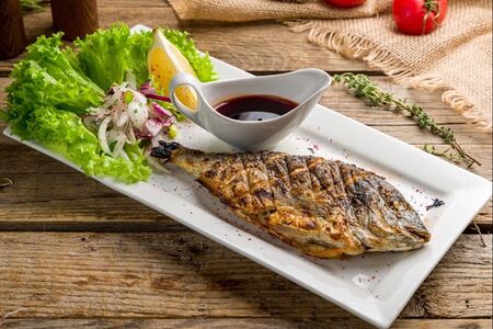 Дорада на мангале