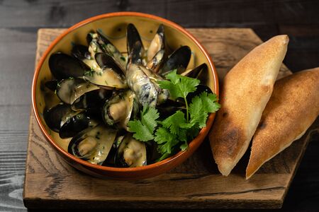 Мидии в соусе горгондзола