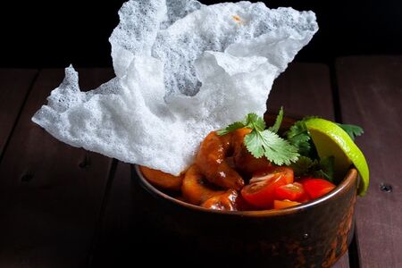 Креветки с рисом в соусе карри