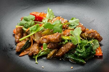 Свинина с овощами в кисло-сладком соусе