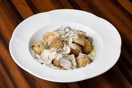 Бейби-картофель с сыром и трюфелем