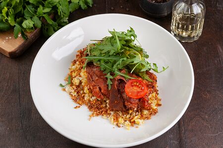 Томленая баранина с булгуром и овощами