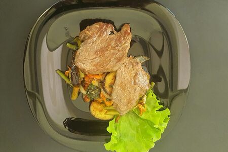 Телятина с овощами