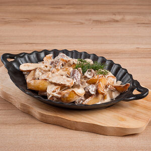 Сковородка с куриными сердечками и грибами