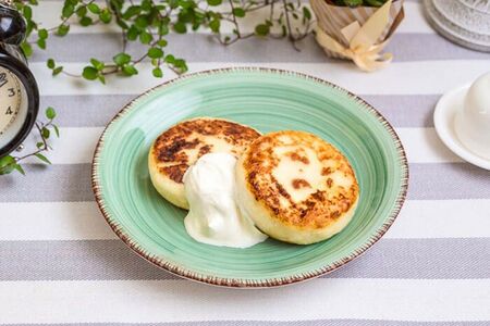 Сырники со сметаной