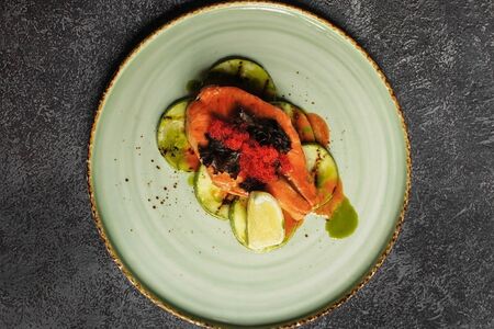 Стейк из форели на подушке из кабачков