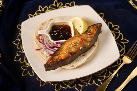 Палтус на мангале 