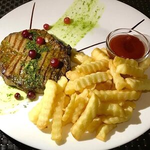 Стейк из cвинoй шеи