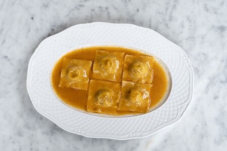 Равиоли с телячьими щёчками