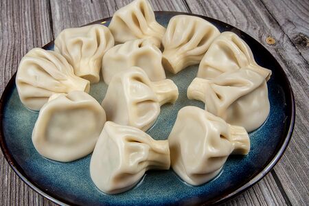 Хинкали со шпинатом и сыром