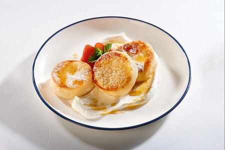 Сырники кон панна ачида