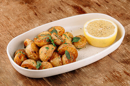 Лимонный картофель из печи