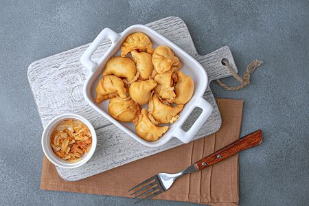 Пельмени жареные с курицей и луком