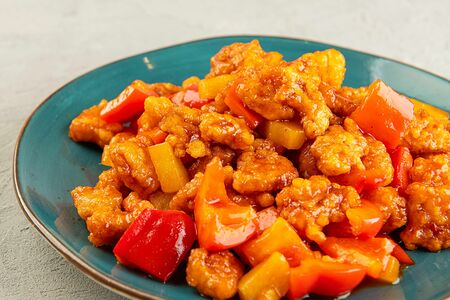 Свинина с ананасами в кисло-сладком соусе