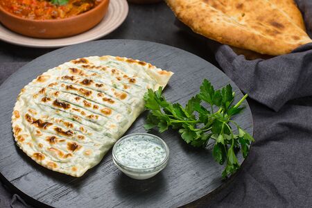 Кутаб с зеленью на мангале