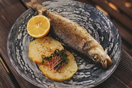 Сибас целиком с корнем сельдерея