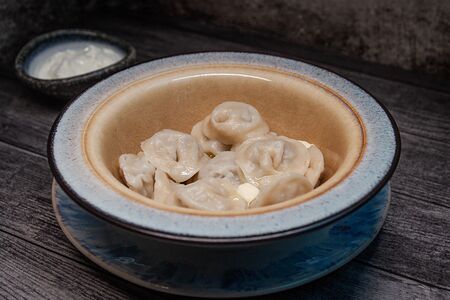 Пельмени с говядиной и сметаной