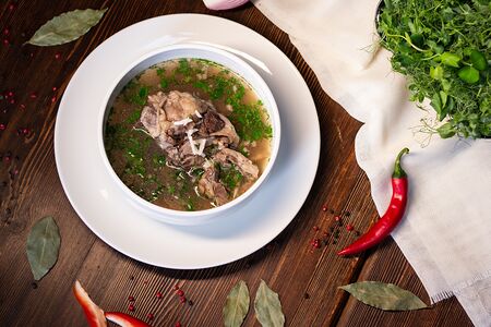 Хвосты говяжьи в бульоне