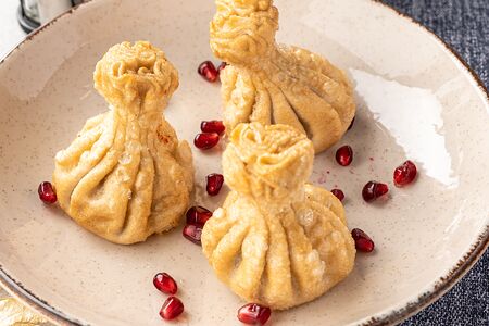 Хинкали жареные со свининой и говядиной