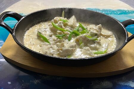 Крымские рапаны с молодым картофелем и зеленым луком