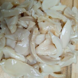 Грибы шампиньоны резаные маринованные