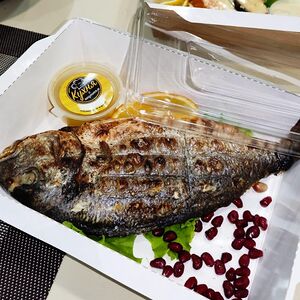 Дорадо на углях с апельсиновым соусом