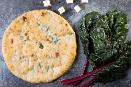 Осетинский пирог с сыром и листьями свеклы