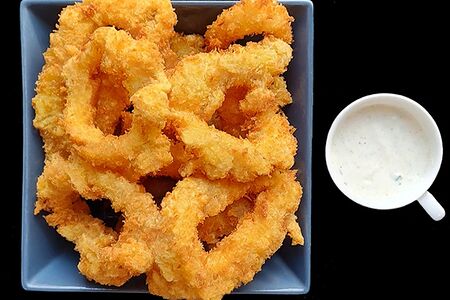 Кольца кальмара в сухарях