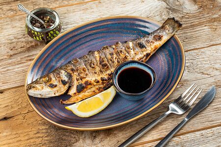 Сибас на мангале