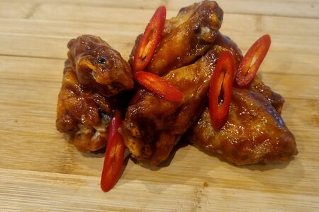Крылья в остром соусе