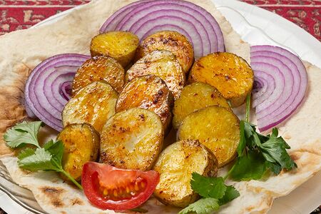 Запечённая картошка с бараньим курдюком