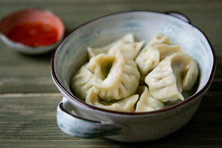 Пельмени с сулугуни и песто